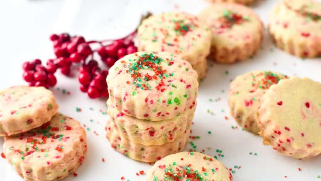 These Homemade Jingles Cookies are delicious buttery shortbread with a touch of anise extract and lovely red and green sugar sprinkles. They are the perfect holiday shortbread for Christmas.